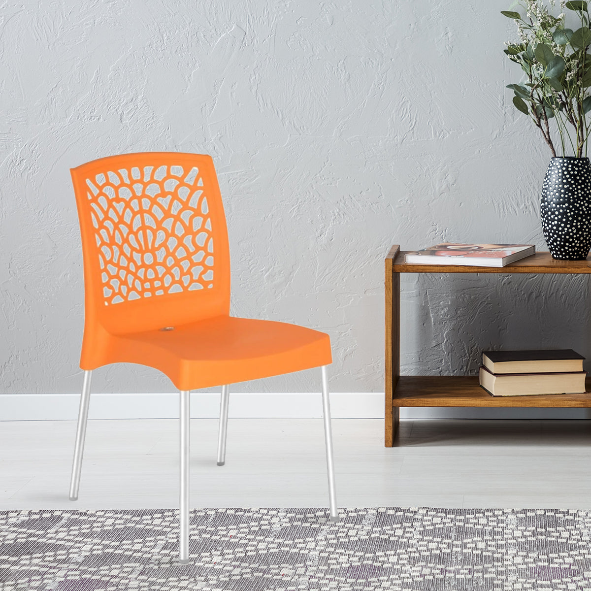 NILKAMAL NOVELLA 19 PLASTIC ARMLESS CHAIR (ORANGE) — Nilkamal | VK Furniture Mangalore