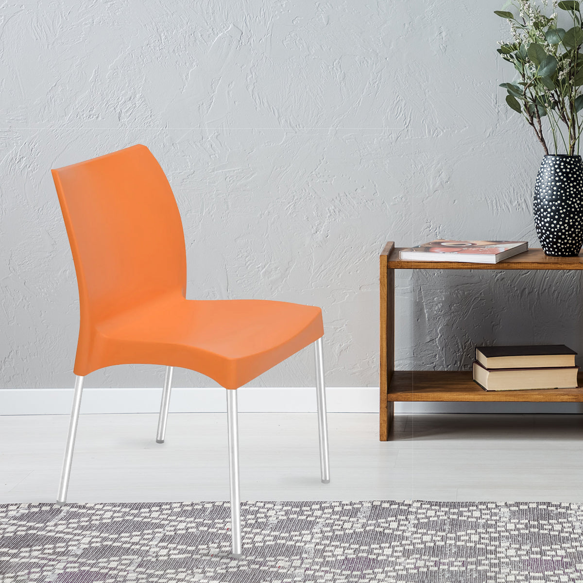 NILKAMAL NOVELLA 07 PLASTIC ARMLESS CHAIR (ORANGE) — Nilkamal | VK Furniture Mangalore
